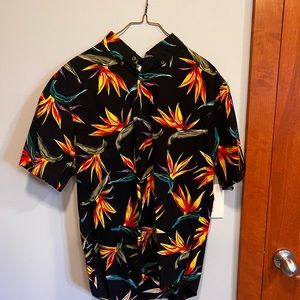 Bright fun button up shirt goes with anything great for parties